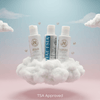 Haetsia Travel Size Kit – TSA Approved mini shampoo and conditioner bottles floating on soft clouds, symbolizing lightness and easy air travel